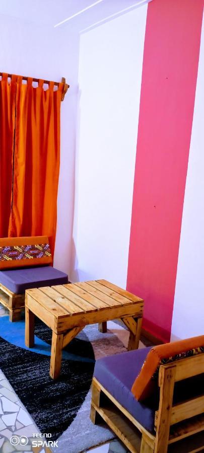 Akwa Guesthouse Котону Экстерьер фото
